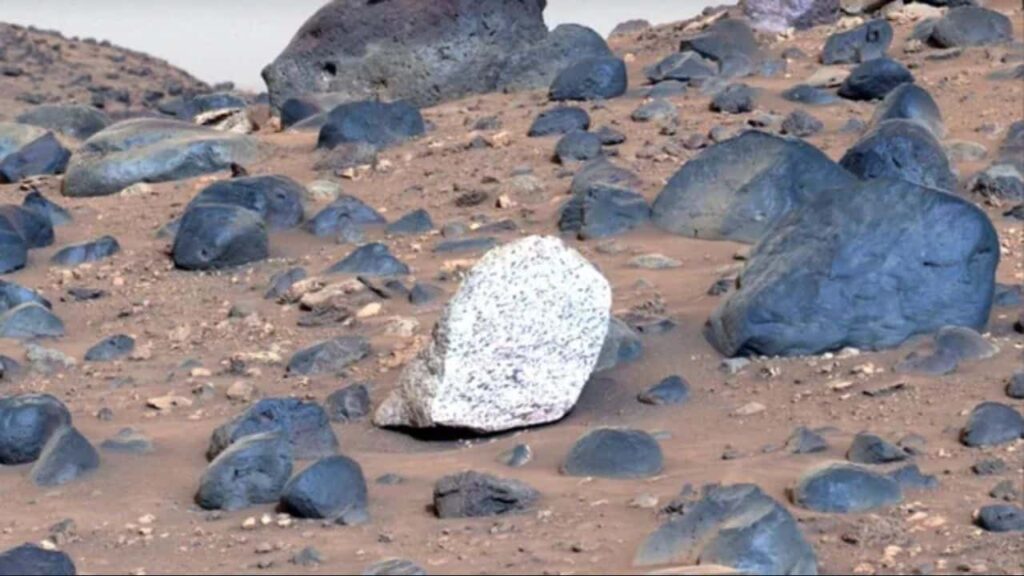 NASA's Perseverance Rover Discovers Unusually Light-Colored Boulder on Mars: Unveiling the Red Planet's Past